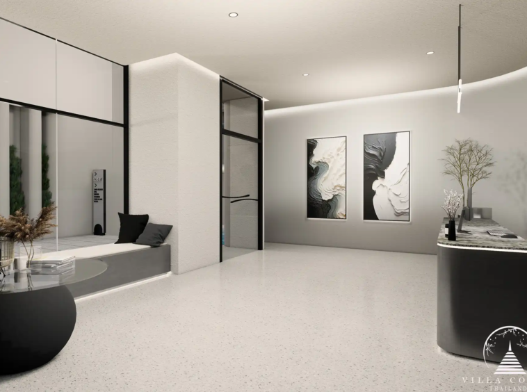 Ever Prime Residences Karon minimalist lobby entrance with art and reception