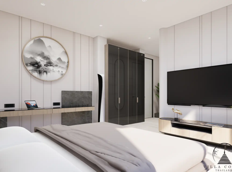 Orbita Villa Town Rawai spacious bedroom with wall-mounted TV and wardrobe