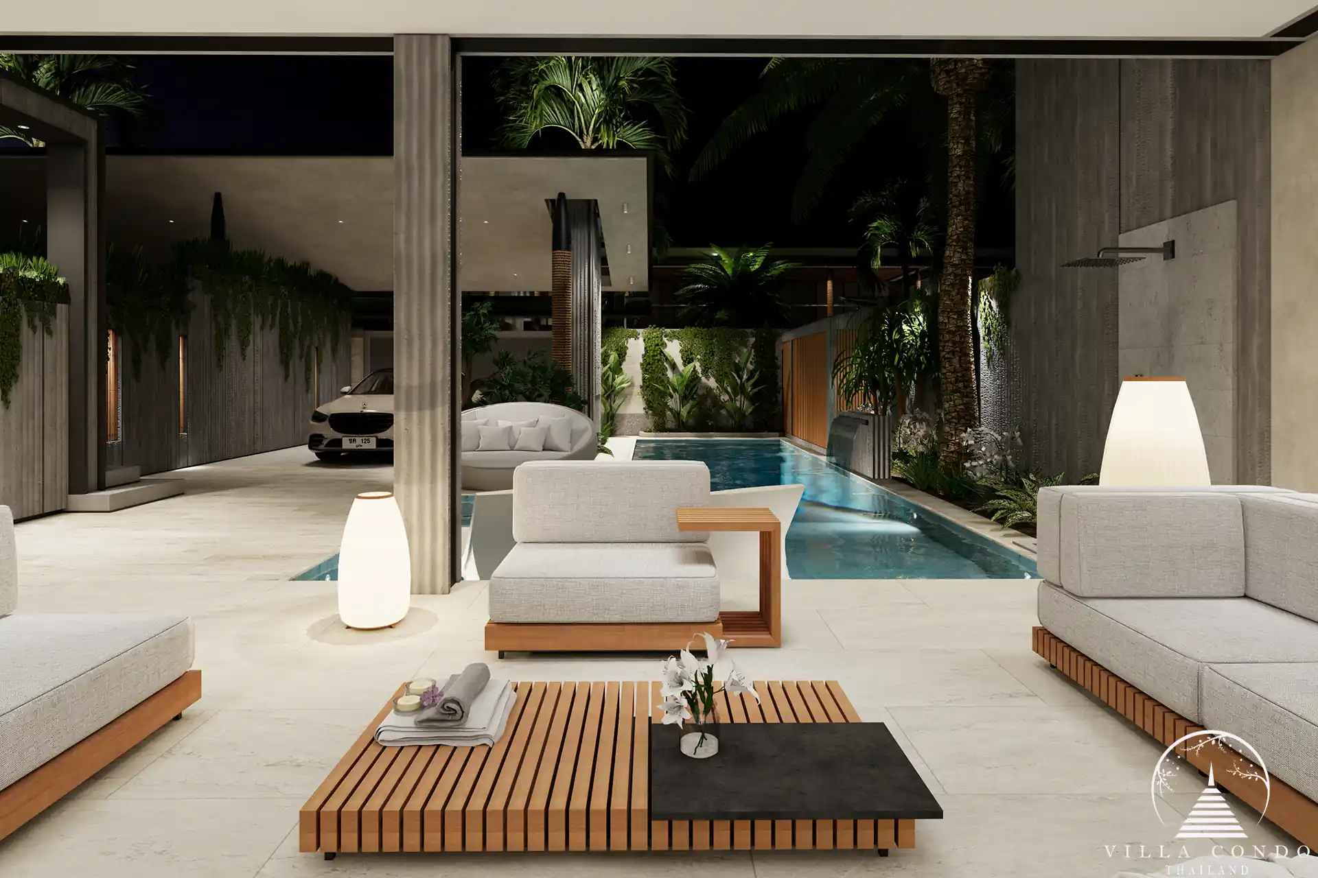 Orbita Villa Town Rawai poolside lounge area with luxury design