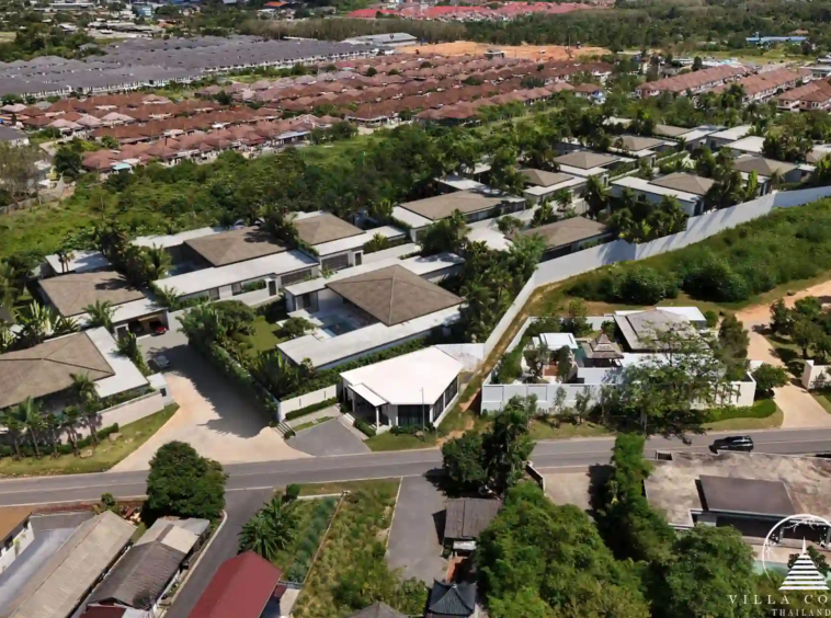 Sunti Villas Bangtao luxury aerial view of private pool villas in Phuket