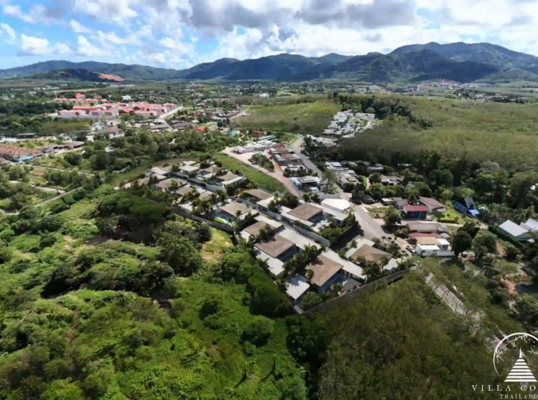 Sunti Villas Bangtao drone shot with lush mountain and villa views