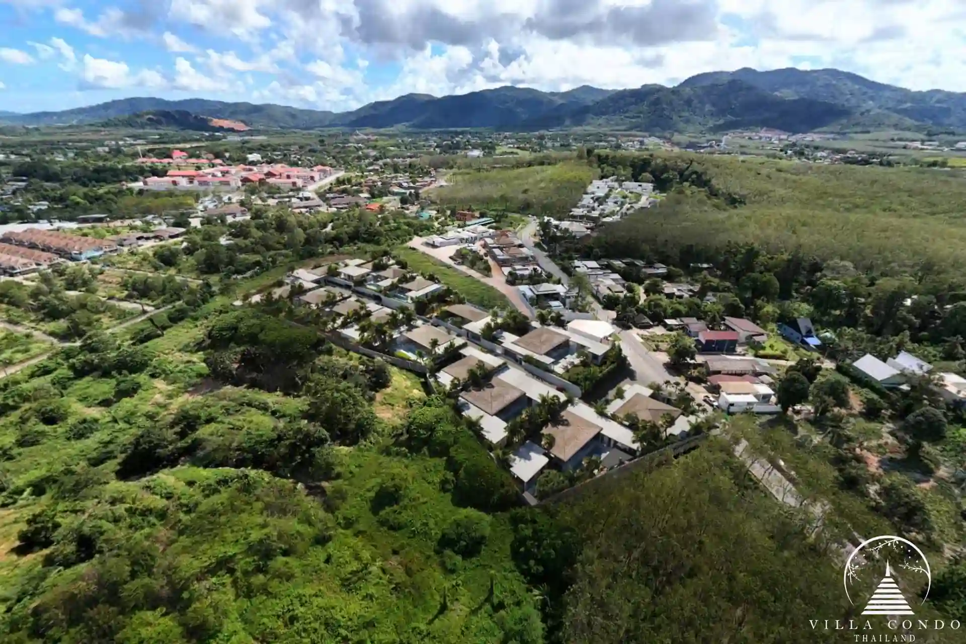 Sunti Villas Bangtao drone shot with lush mountain and villa views