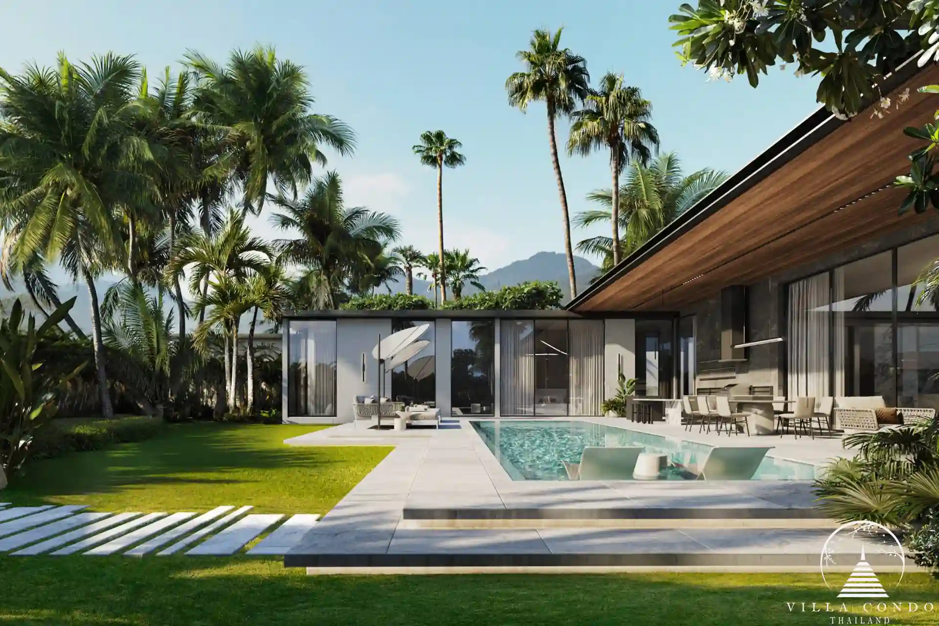 Sunti Villas Bangtao infinity pool with mountain backdrop in Phuket