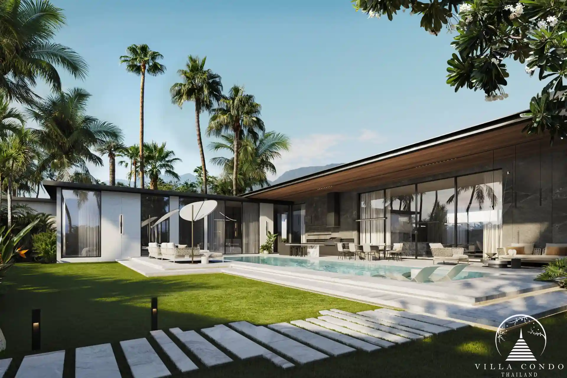 Sunti Villas Bangtao luxury poolside with tropical surroundings