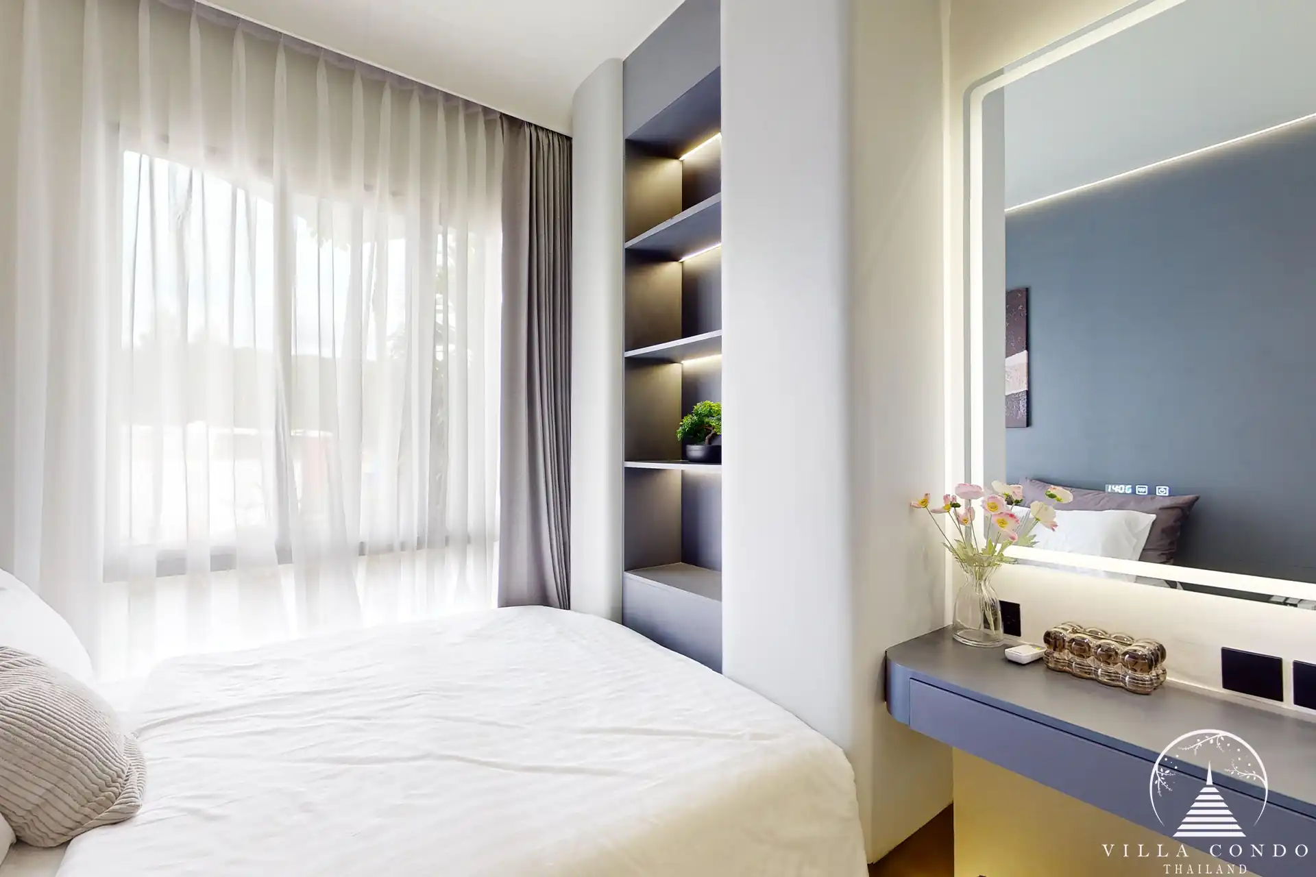 The Element Condo Kamala bright bedroom with large window and modern design