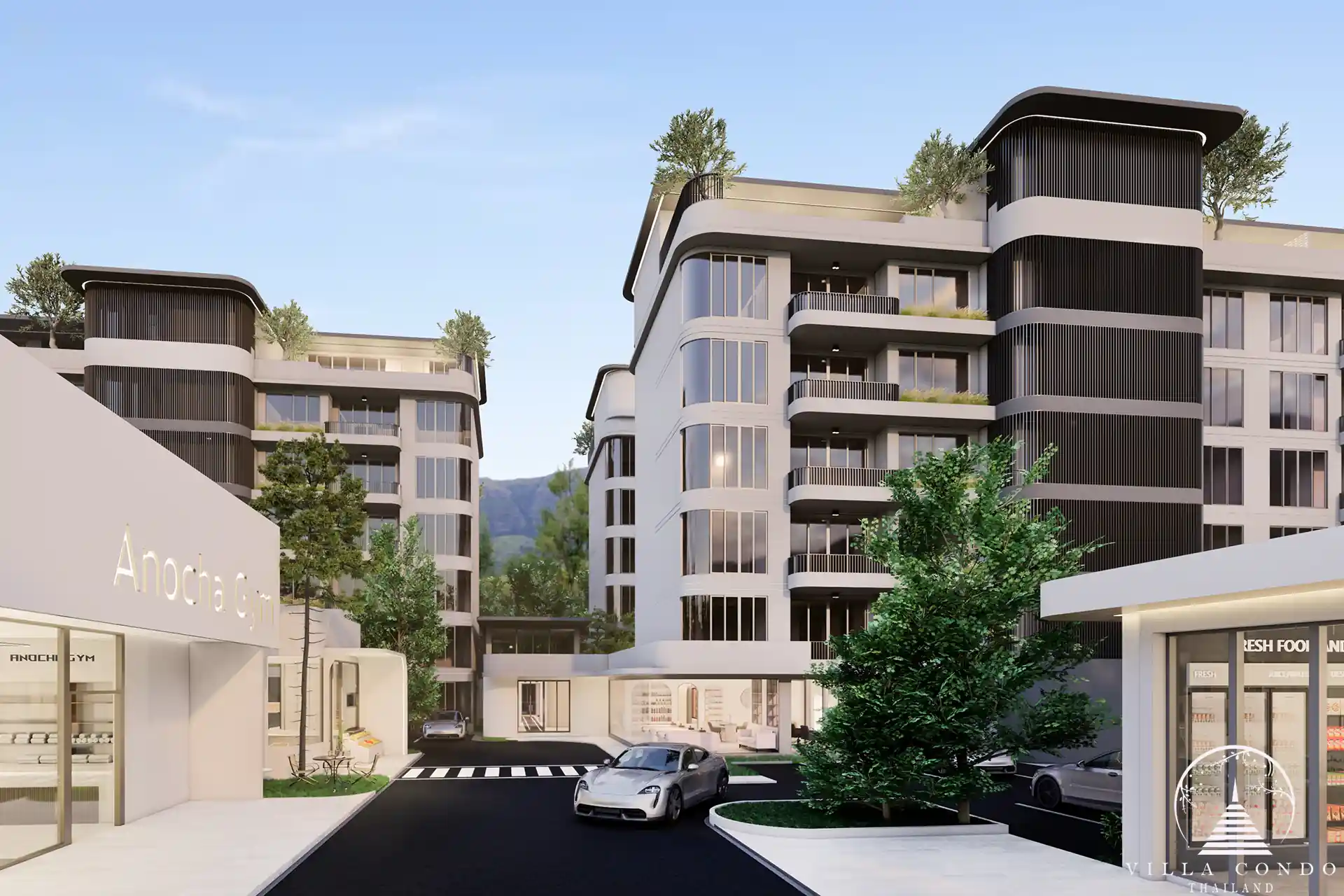 The Element Condo Kamala main entrance with modern architecture and cars
