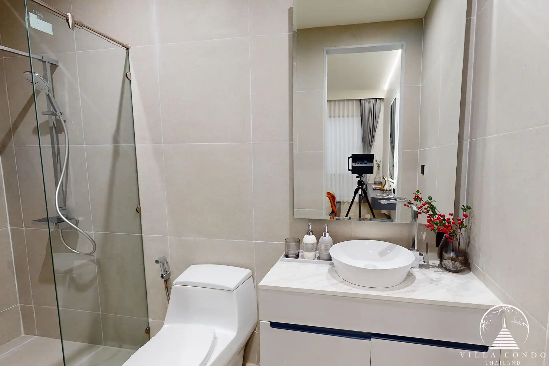 The Element Condo Kamala modern bathroom with glass shower and vanity