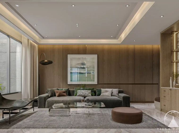 The Forest Patong Condo warm lounge with wood paneled feature wall