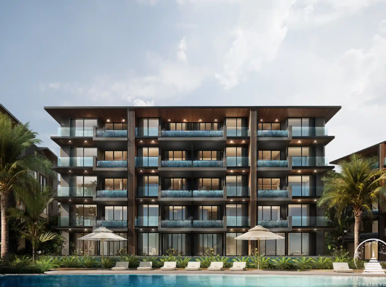 The Forest Patong Condo contemporary building with poolside sun loungers view