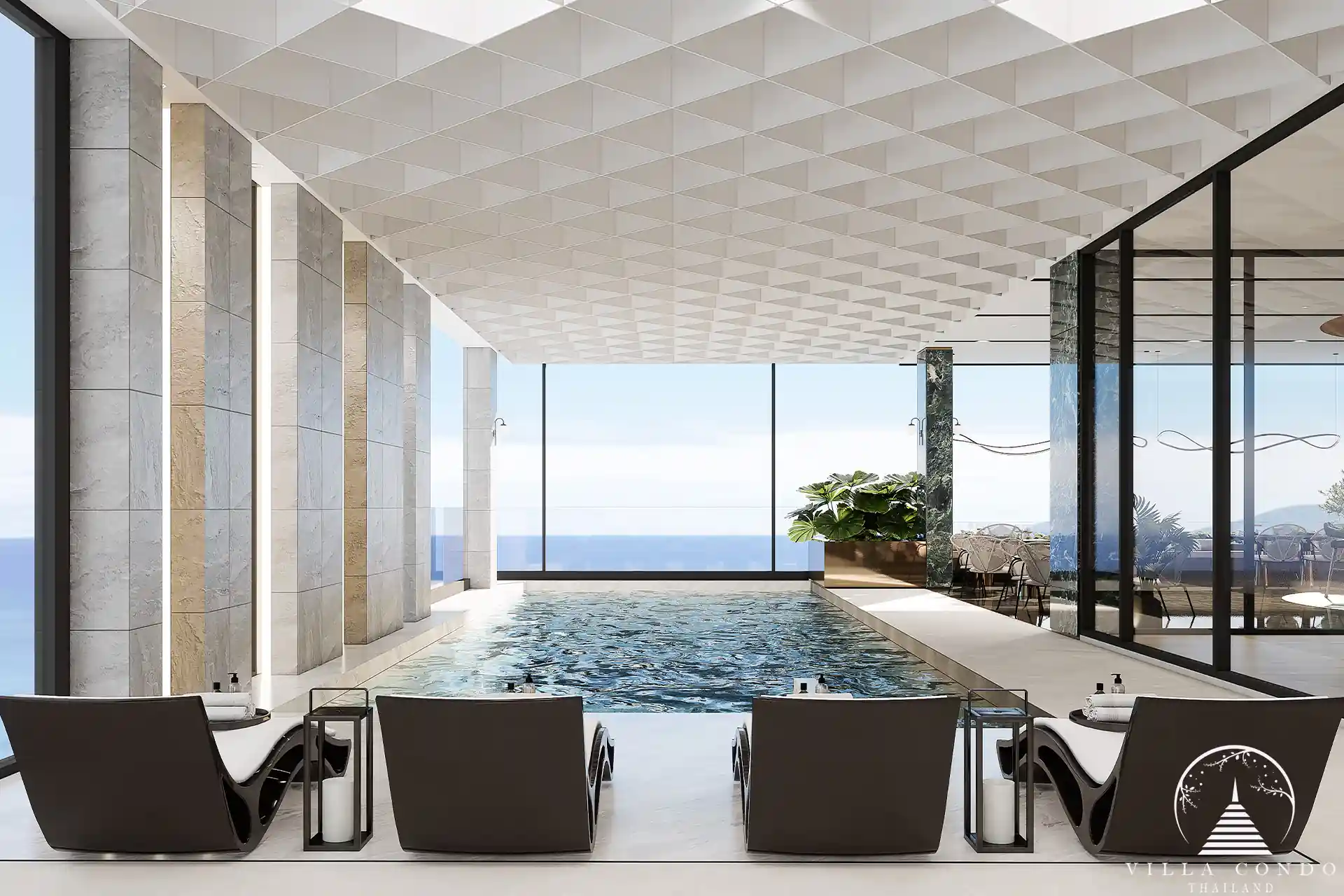 The Forest Patong Condo indoor sky pool facing blue ocean horizon