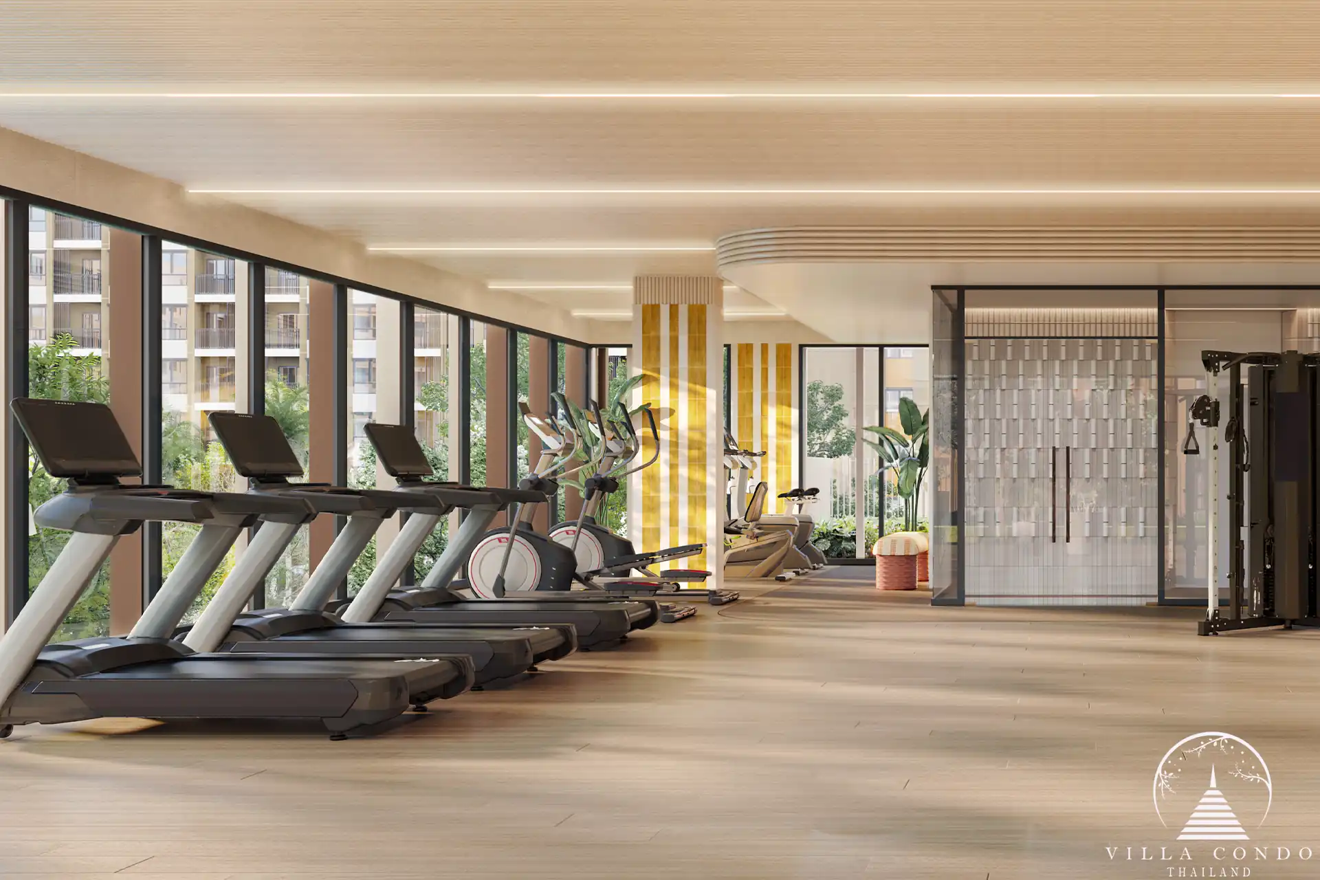 Dcondo Cove fitness gym cardio treadmills beside full-height windows Phuket
